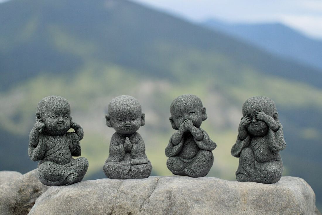 Four Wise Little Monk Statues